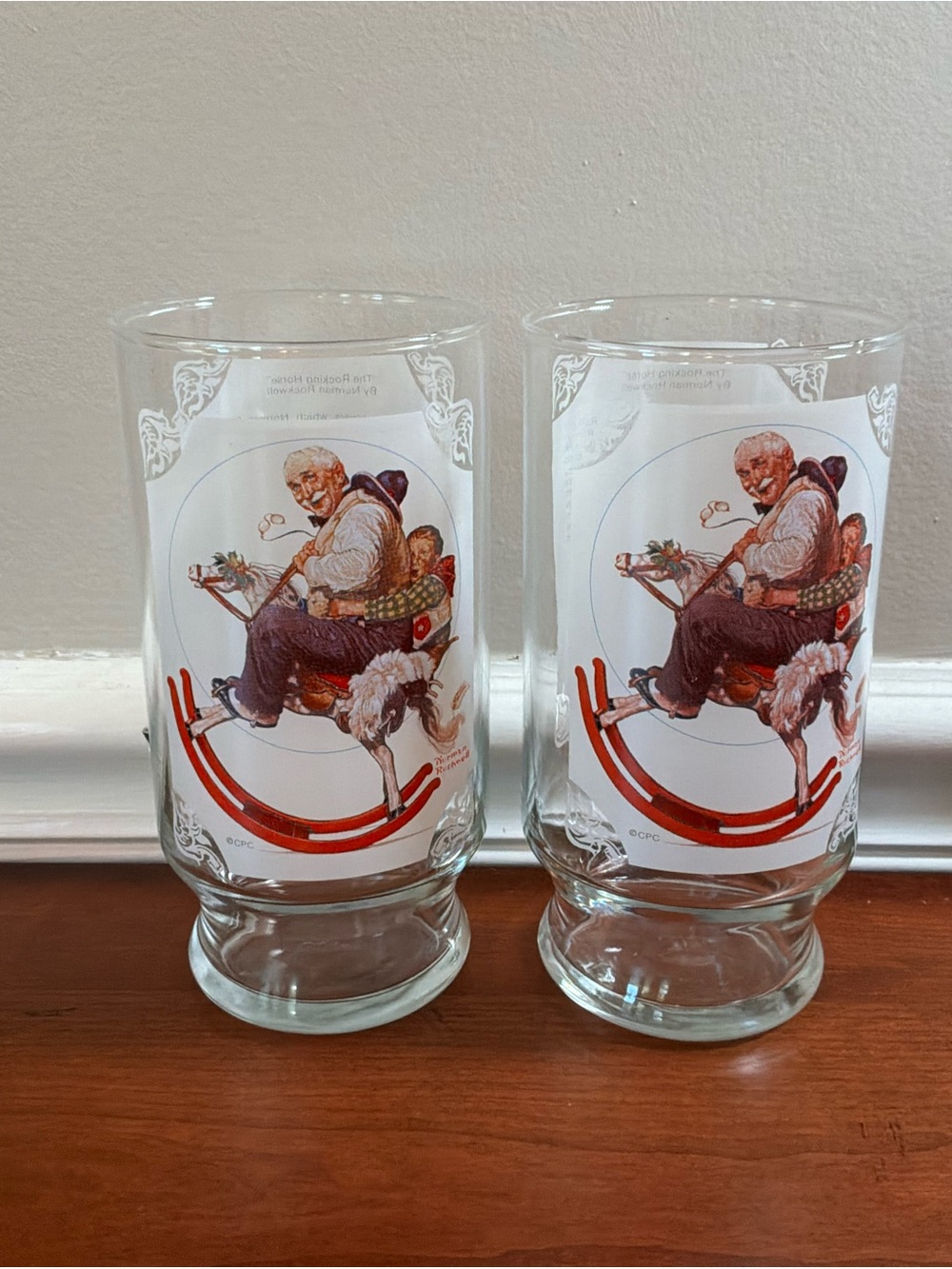 Set of 2 Vintage Santa Rocking Horse Glasses - Norman Rockwell‎